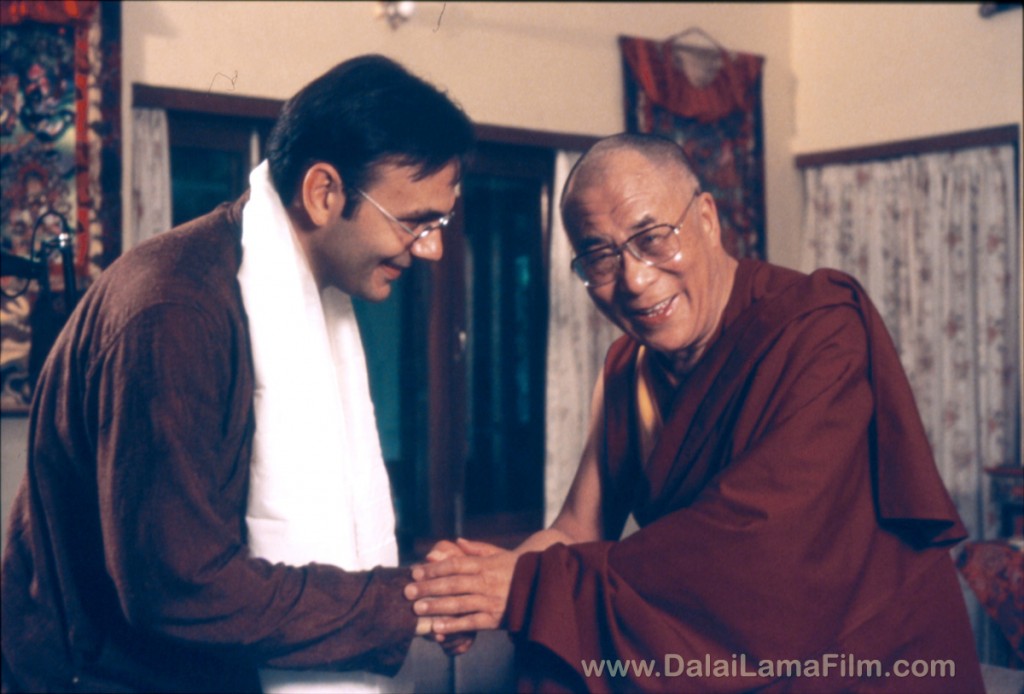 Dalai Lama giving blessing kata scarf to Director Khashyar Darvich during filming for the Dalai Lama Awakening Documentary Film